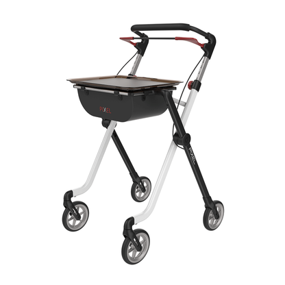 The Rehasense Pixel Indoor Rolling Walker features a modern black and white frame, four wheels, ergonomic handles, and a flat tabletop with storage underneath—ideal for indoor mobility and support.