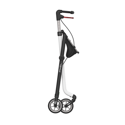 The Rehasense Pixel Indoor Rolling Walker features a slim black and silver frame, two large wheels, and a compact folding design. It includes a small storage pouch for convenience, making it ideal for modern indoor mobility.