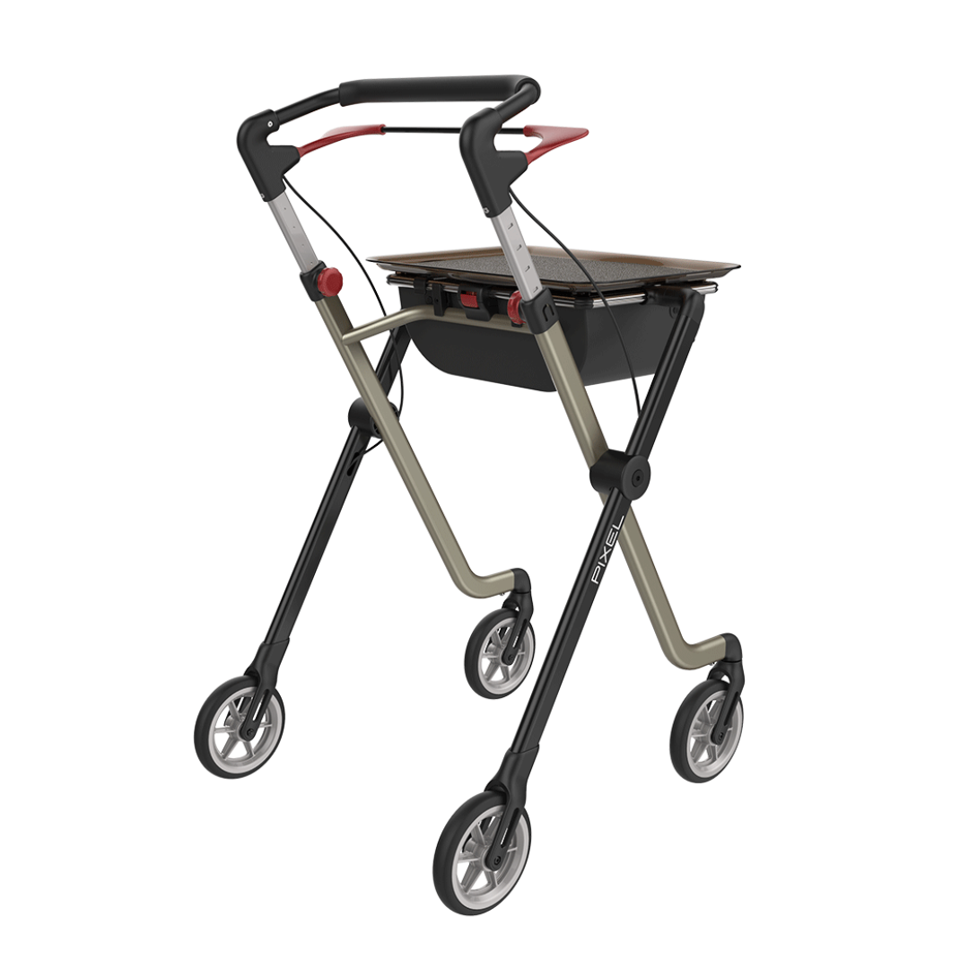 The Rehasense Pixel Indoor Rolling Walker features a dark frame, four wheels, ergonomic handles, hand brakes, a flat tray surface, and storage compartment for modern lightweight mobility indoors.