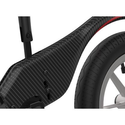 Close-up of the Rehasense Single-Arm Track Wheel - XL 12" Carbon Outdoor Wheel featuring a carbon fiber texture and a large, black, treaded tire. The frame offers a sleek, modern look with a matte finish.