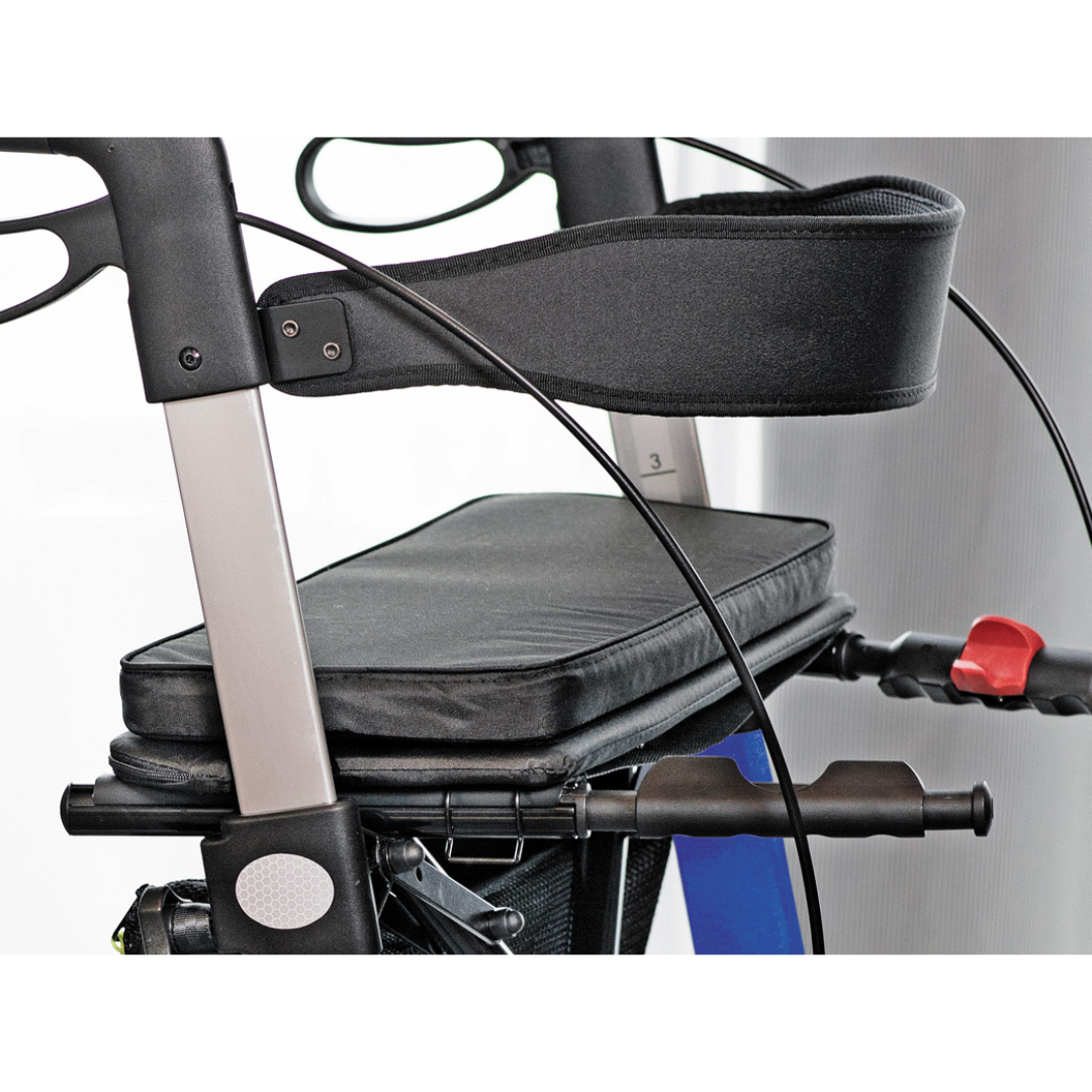 Close-up of the black padded armrest and handlebar on the Rehasense Spark LX Ultralight Rollator, featuring curved handles, support straps, and adjustment knobs—an ideal lightweight mobility solution.
