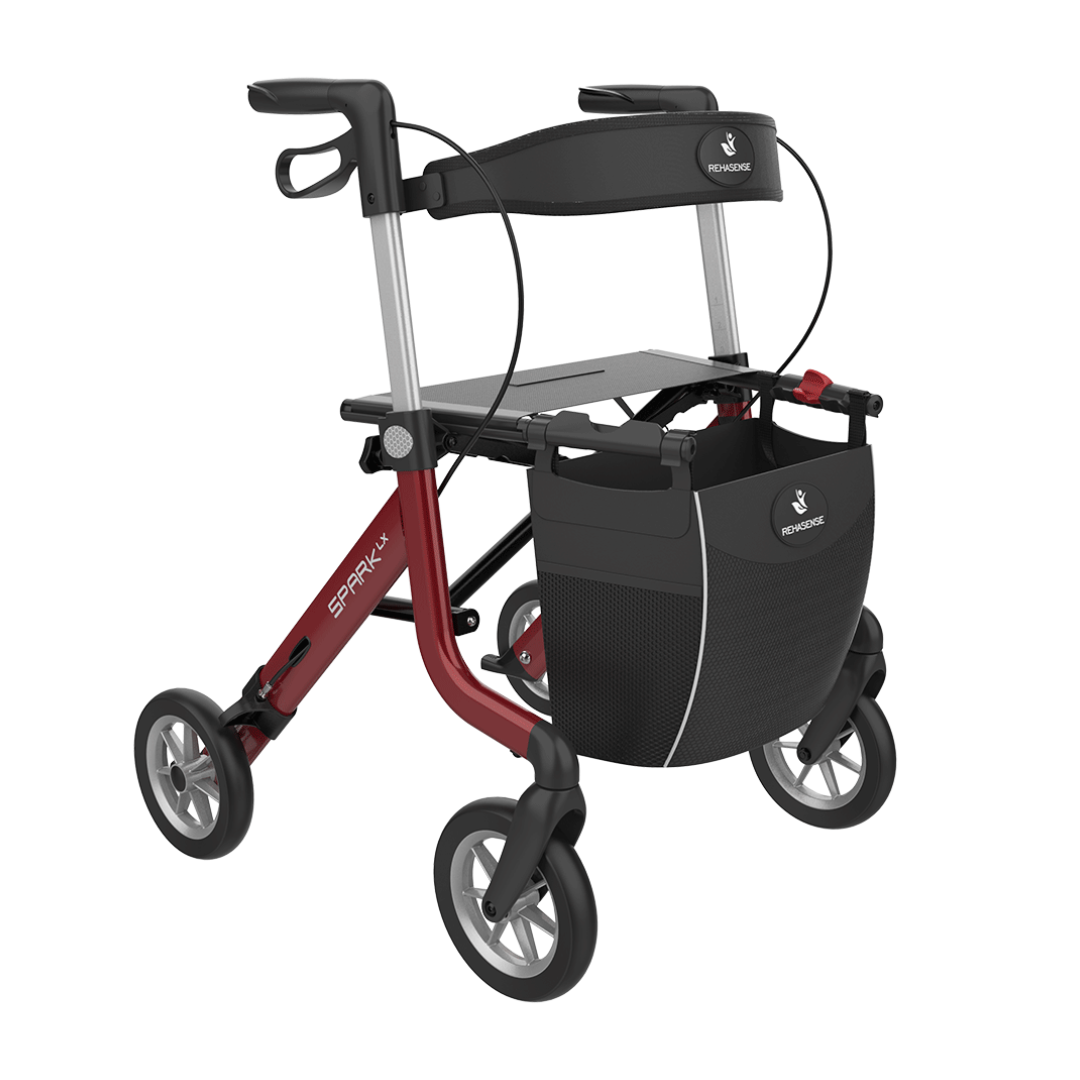 The Rehasense Spark LX Ultralight Rollator is a lightweight red and black aluminum walker with four wheels, a padded seat, storage bag, hand brakes, and sturdy frame—offering comfortable and reliable mobility support.