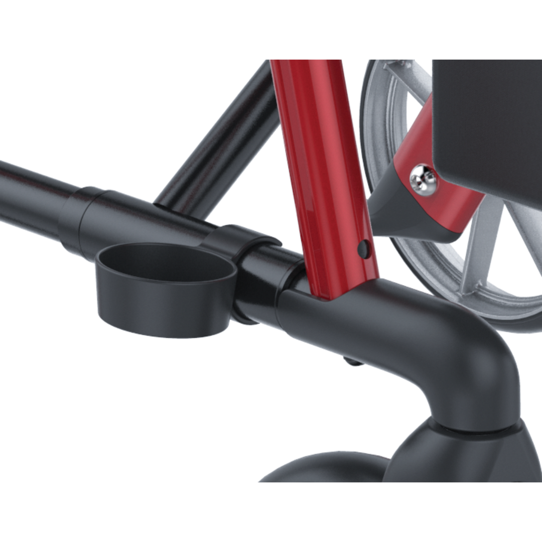 Close-up of a black plastic cup holder attached to the Rehasense Stylus Premium Indoor & Outdoor Rollator, showing part of its red frame and grey wheel—an accessory feature of this rollator model.