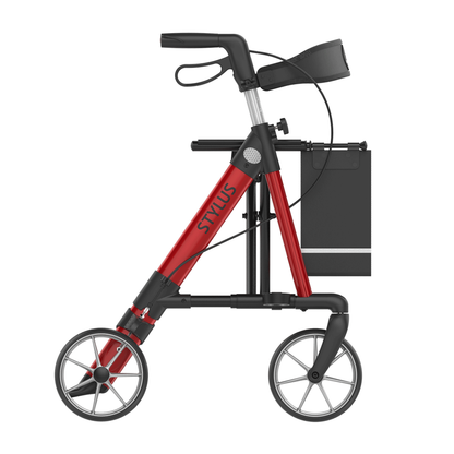 The Rehasense Stylus Premium Indoor & Outdoor Rollator is a modern red and black rollator with large front wheels, smaller rear wheels, handlebars, and a STYLUS-labeled side pouch—ideal for indoor and outdoor use.