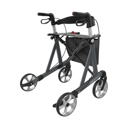 The Rehasense Varsity HD XL Bariatric Lightweight Rollator features a gray frame with black and red accents, four large wheels, hand brakes, a black seat, a storage pouch, and a compact foldable design for reliable mobility assistance.