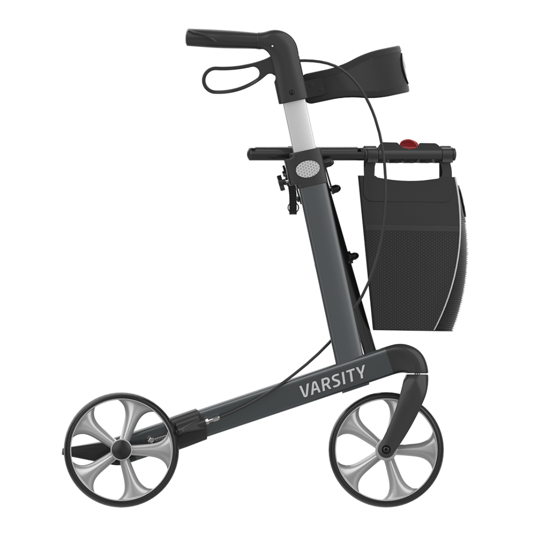 The Rehasense Varsity Folding Aluminum Rollator features a lightweight black and gray frame with four large wheels, a handlebar with brakes, and an attached storage bag. "VARSITY" is printed on the modern frame.
