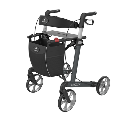The Rehasense Varsity Folding Aluminum Rollator is lightweight with a foldable black frame, four large wheels, hand brakes, a built-in seat, and a front storage pouch. "Varsity" branding is visible on the frame.