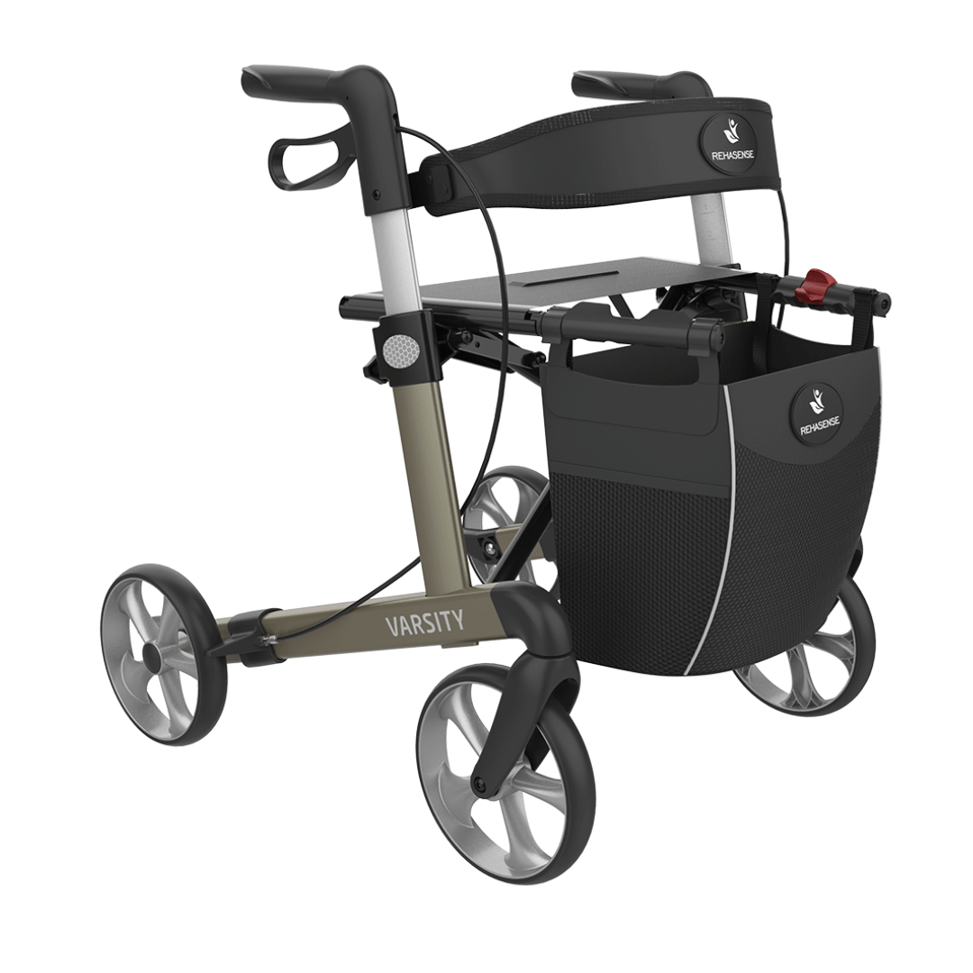 The Rehasense Varsity Folding Aluminum Rollator features four wheels, a sturdy lightweight frame, black seat, hand brakes, and a front storage bag.