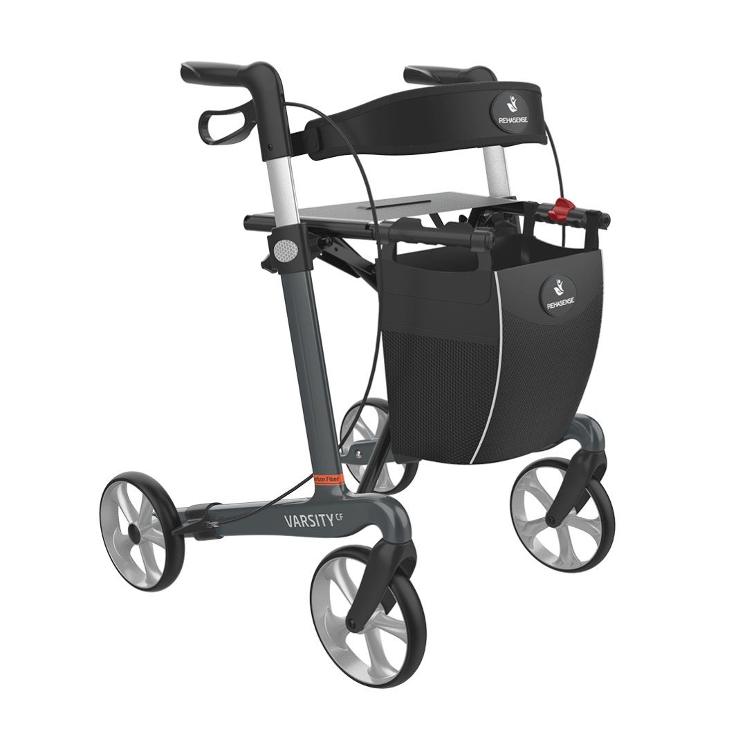The Rehasense Varsity CF Ultra-Lite Carbon Fiber Rollator features an ultra-light black and gray frame, four wheels, ergonomic handles, a black mesh storage bag, and modern design for easy mobility.