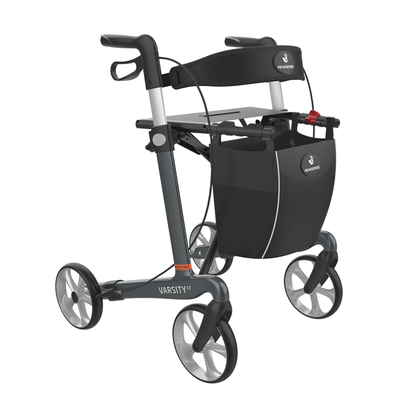 The Rehasense Varsity CF Ultra-Lite Carbon Fiber Rollator features an ultra-light black and gray frame, four wheels, ergonomic handles, a black mesh storage bag, and modern design for easy mobility.
