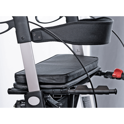 Close-up of the padded seat and support bar on the Rehasense Varsity HD XL Bariatric Lightweight Rollator, featuring black cushions, a sturdy metal frame, cables, and handles—showcasing its comfortable and robust design.