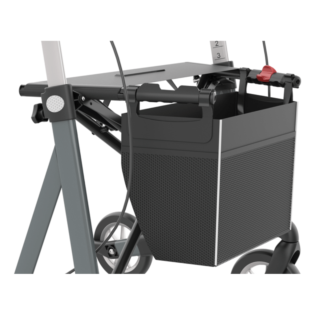 Close-up of the Rehasense Varsity HD XL Bariatric Lightweight Rollator in black and gray, highlighting its storage basket, lightweight aluminum frame, wheels, handle with red brake lever, and height adjustment indicator.