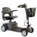 The FDA-cleared Reyhee Cruiser Portable Electric Mobility Scooter features four wheels, a foldable tiller for easy steering, a black seat with armrests, and a front basket. Its compact design is ideal for both indoor and outdoor use.