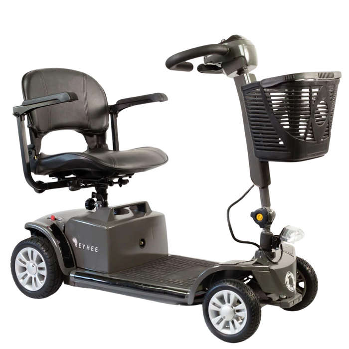 The Reyhee Cruiser Portable Electric Mobility Scooter, FDA-cleared for personal mobility assistance, features a black seat, backrest, and armrests. It offers four wheels, a foldable tiller for compact storage, and includes a front basket.