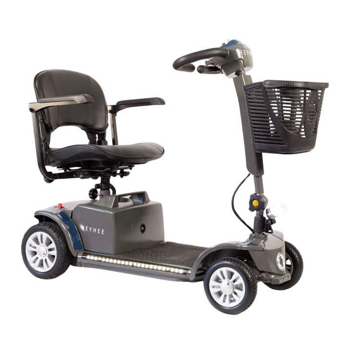 Discover the Reyhee Cruiser Portable Electric Mobility Scooter, an FDA-cleared model with cushioned seat, armrests, foldable tiller, four wheels, LED base lights, and a convenient front basket. Perfect for personal transportation in stylish grey and black.