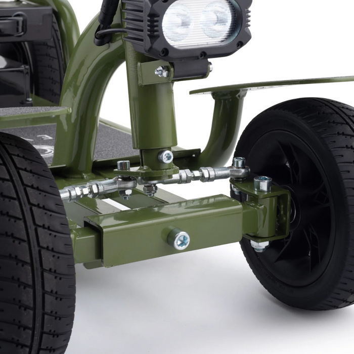 Close-up of the Reyhee EXO Portable 4-Wheel Mobility Scooters front suspension and wheels. Features a sturdy frame, compact shock absorber system, two black rubber tires, and a mounted light. Design indicates durability and off-road capability.