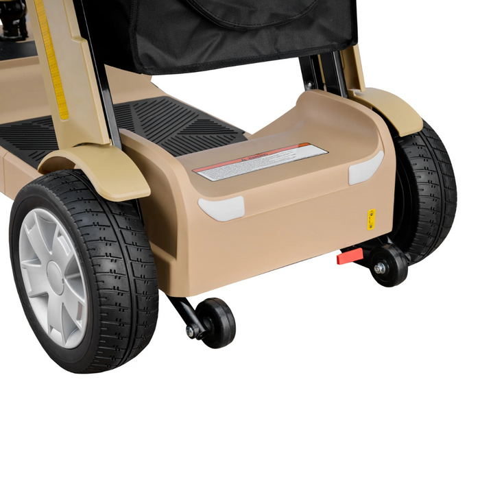 A close-up of the Reyhee Flex Electric Folding Mobility Scooter highlights its sturdy, puncture-free tires. The design features two large rear wheels with textured treads and two smaller front swivel wheels for smooth navigation. A warning label is present on the base near the reliable wheels.