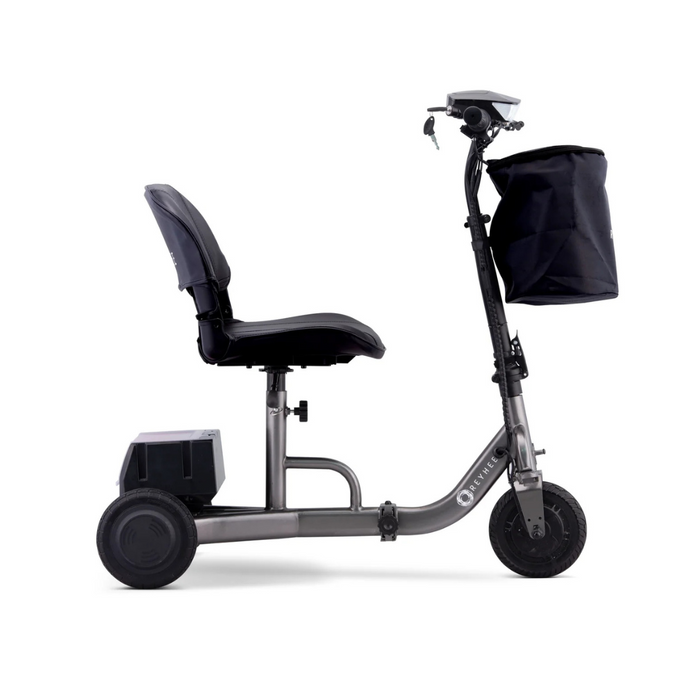 A side view of the Reyhee Triad Compact Folding Electric Mobility Scooter reveals a sleek, three-wheeled design. It has a cushioned seat, handlebar controls, front storage bag, metal frame, and small wheels. The scooter includes the innovative Swap & Go Battery System for easy mobility.