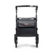 The black Rollz FLEX 2 Lightweight Rollator Walker features a handle, four wheels, and folds upright. Its sleek design includes a brown label on the front, offering stylish portability with an XL storage bag and seat.