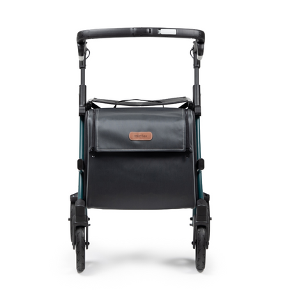 The Rollz FLEX 2 is a stylish, black and teal folding stroller seen from behind, featuring an XL storage compartment with a flap, four wheels, and a handlebar. This lightweight rollator walker is compact and modern, combining convenience with style.