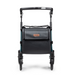 The Rollz FLEX 2 is a stylish, black and teal folding stroller seen from behind, featuring an XL storage compartment with a flap, four wheels, and a handlebar. This lightweight rollator walker is compact and modern, combining convenience with style.