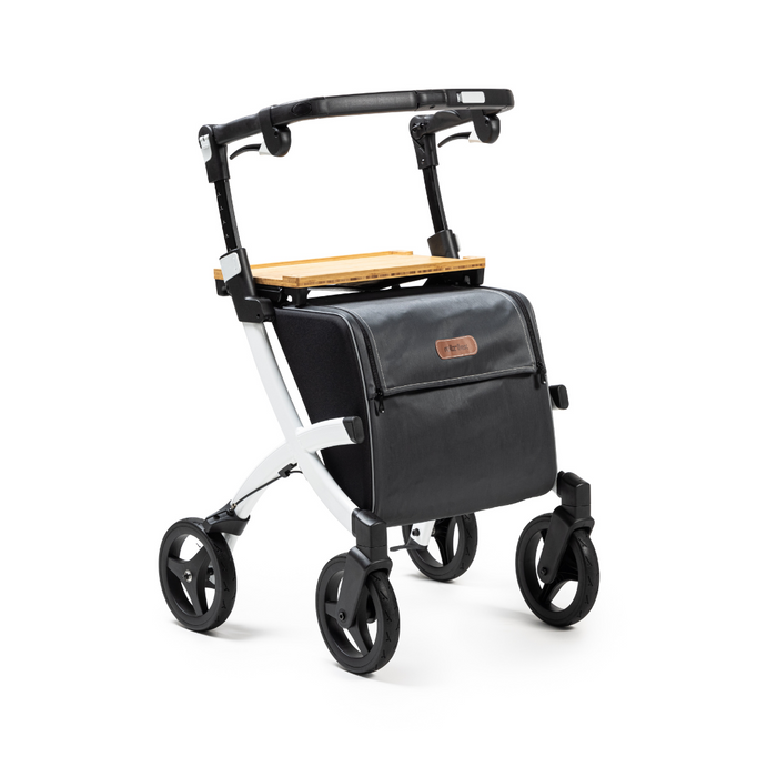 The Rollz FLEX 2 is a modern, lightweight rollator walker with a black frame and four wheels. It features a wooden seat and an XL storage bag integrated into its sleek, compact design, making it ideal for mobility assistance.