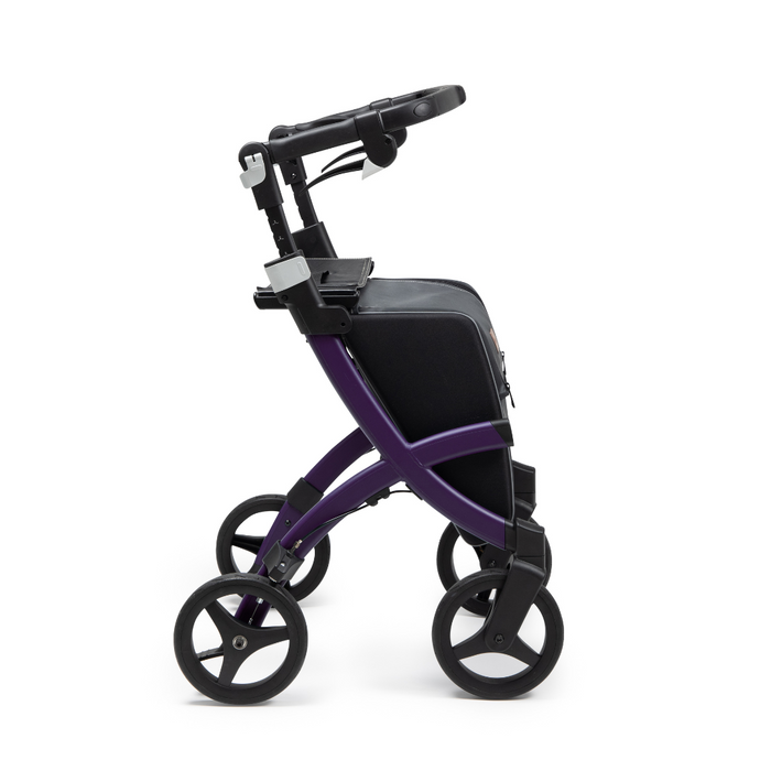 The Rollz FLEX 2 Lightweight Rollator Walker features a purple and black foldable design with four wheels, ergonomic handles for easy mobility, a padded seat, and an XL storage bag underneath.