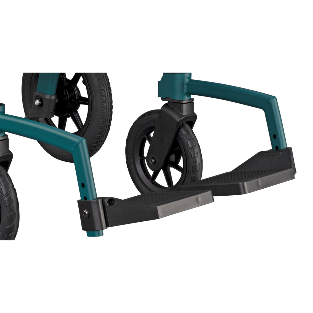 A close-up shows the teal Rollz Motion Performance All-Terrain 2-In-1 Rollator Transport Chairs front wheels and curved footrests against a white background. Black air-filled tires with a textured surface ensure superior shock absorption.