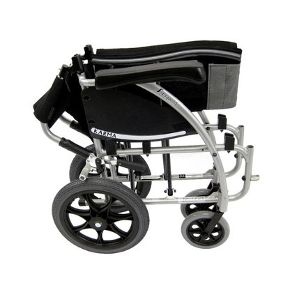 The Karman S-Ergo 115 Ergonomic Ultralite Transport Wheelchair is compact and ultra-lightweight, with a foldable silver frame for easy storage. It features large rear and smaller front wheels, plus anti-bacterial upholstery on the black seat for comfort and hygiene.