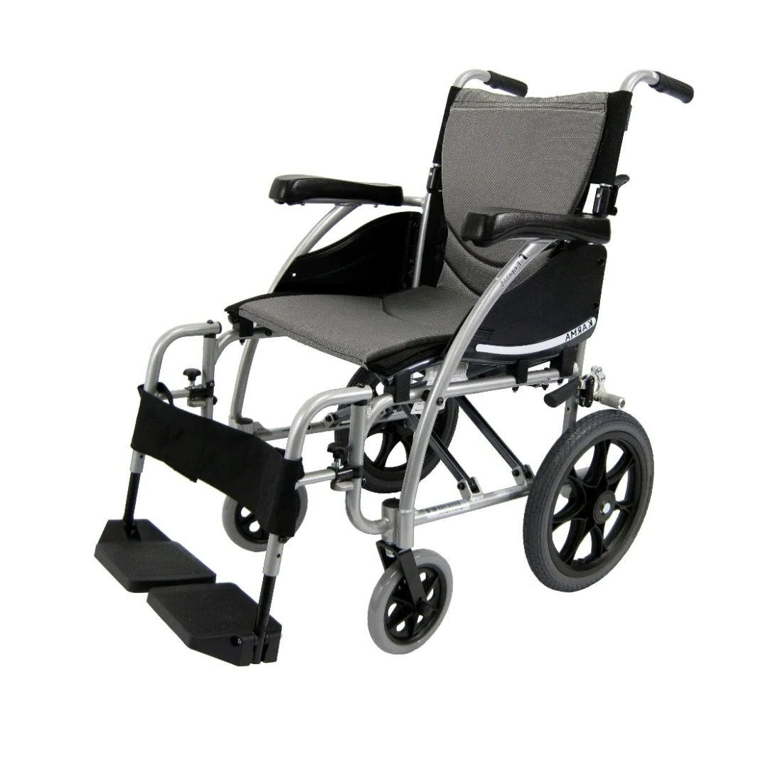 The Karman S-Ergo 115 Ergonomic Ultralite Transport Wheelchair features an ultra-lightweight design with a gray seat and backrest, black armrests, footrests, a silver frame, large rear wheels for easy maneuvering, smaller front wheels, and anti-bacterial upholstery for added hygiene.