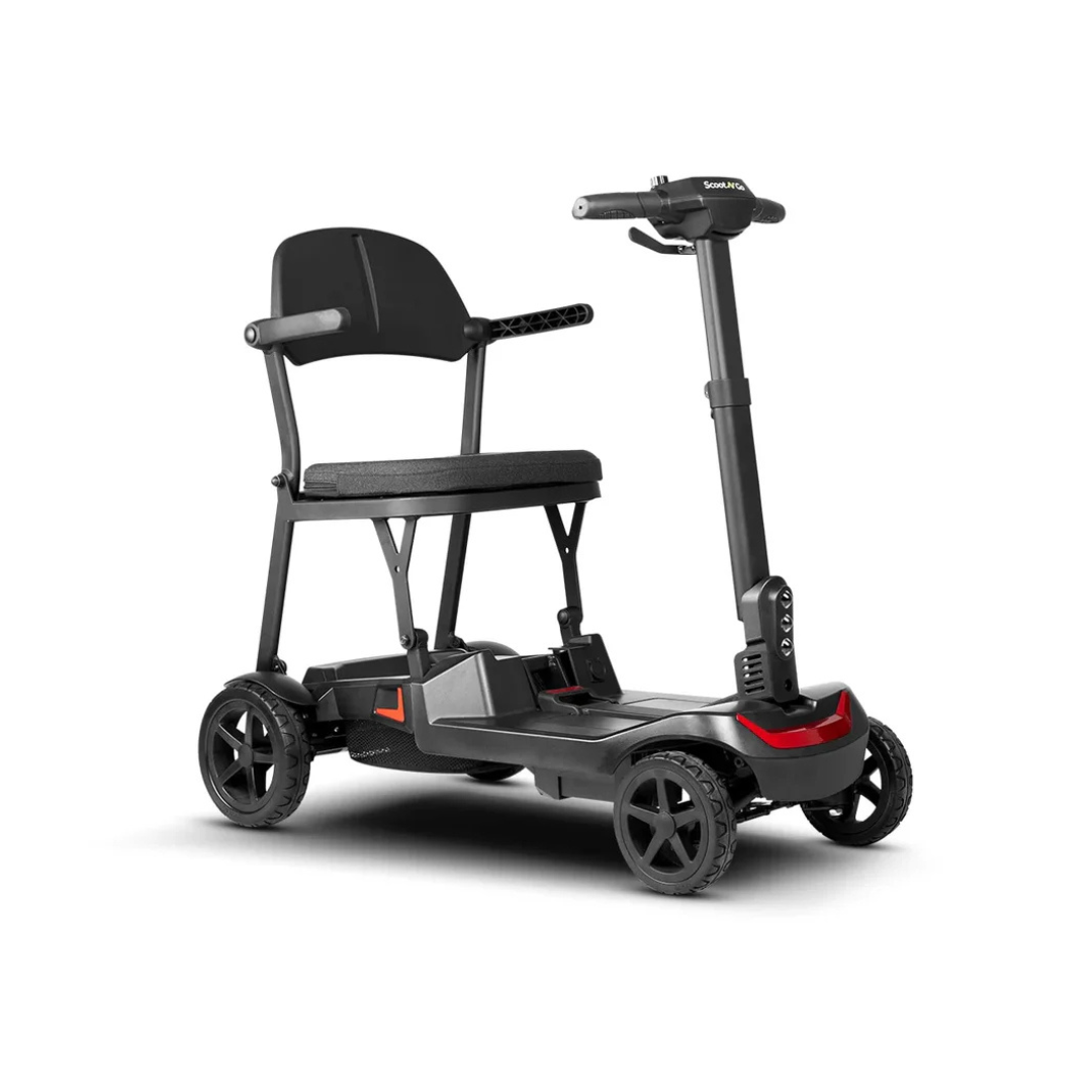 The ScootNGo Lite Portable Folding Scooter is a compact black four-wheel scooter with a padded seat, armrests, and handlebars. Its modern, minimal look offers reliable personal mobility—see product specifications for more details.