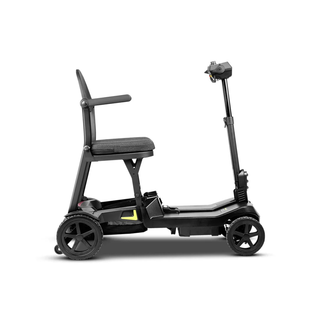 Side view of the ScootNGo Lite Potable Folding Scooter, a compact, foldable mobility scooter with a cushioned seat, armrests, four wheels, and handlebars—ideal for easy transport and mobility. See spec table for details.