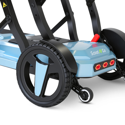 Close-up of the blue ScootNgo Voyager Lightweight Folding Scooter, highlighting the rear wheel, stabilizing wheel, red reflectors, and part of the sturdy frame.