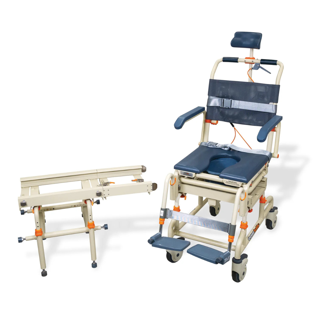 The ShowerBuddy SB2T TubBuddy with Tilt, in beige and blue, is shown with its matching detachable wheeled transfer platform. Both feature orange adjustment knobs and handles, plus adjustable headrest and leg supports.
