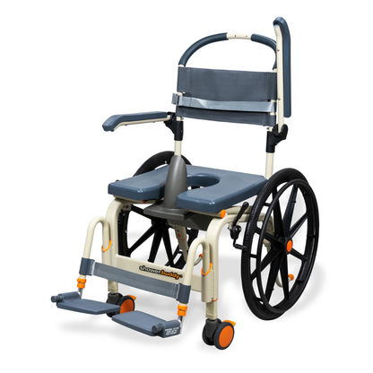 The ShowerBuddy SB6W Roll-In Shower Wheelchair is a gray and beige self-propelled shower and commode chair with large rear wheels, small front casters, a padded seat opening, armrests, and footrests.