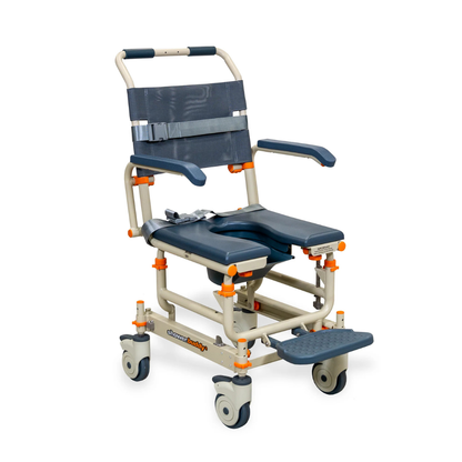 The ShowerBuddy® SB1 Transfer System is a mobile shower commode chair with a metal frame, padded seat and backrest, armrests, footrest, four casters, safety straps, and orange adjustment knobs for assisted bathing or toileting.