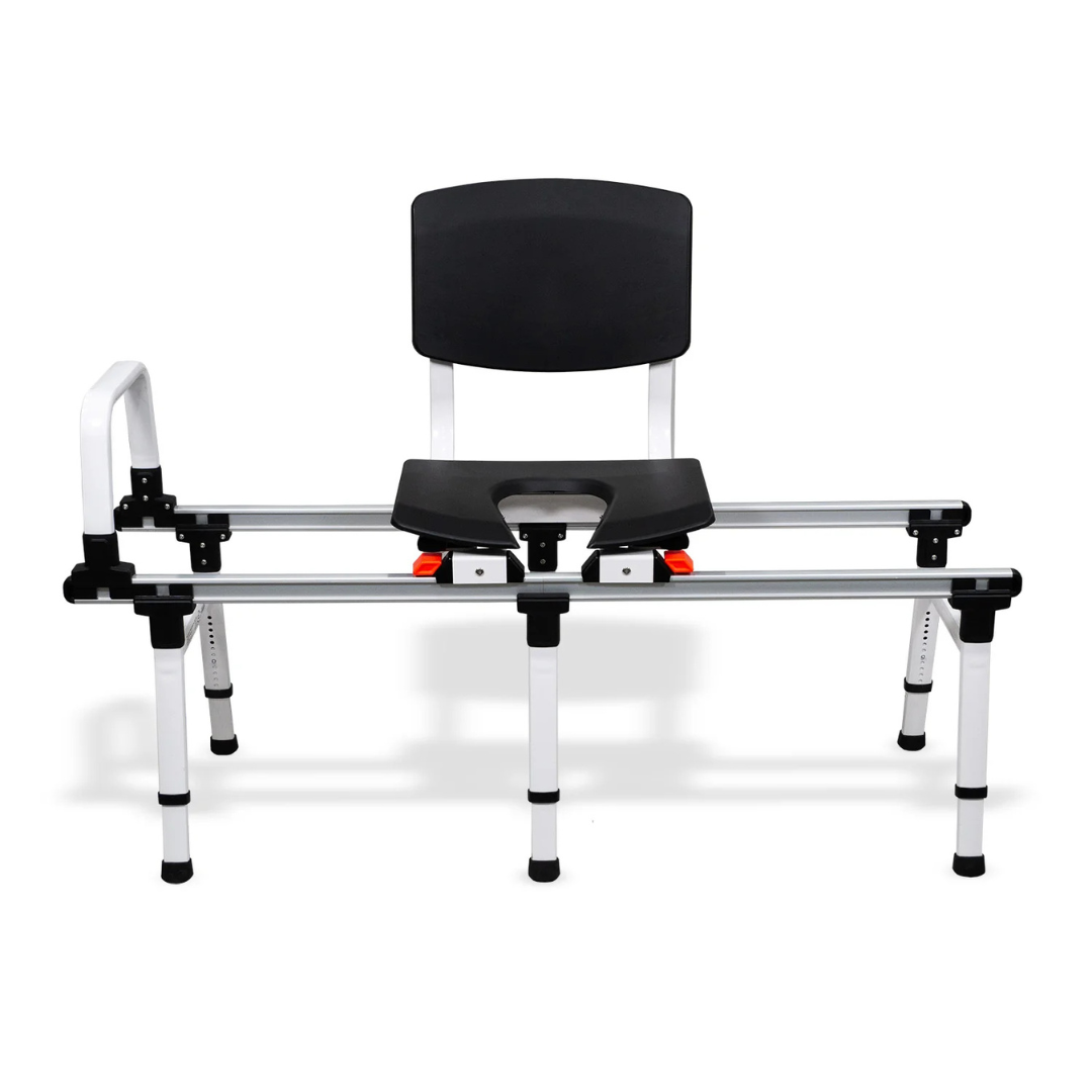 ShowerGlyde SG2 Sliding Transfer Bench features a black padded seat and backrest, white frame, safety rail, and height-adjustable legs—perfect for safe tub and toilet transfers in bathroom setups.