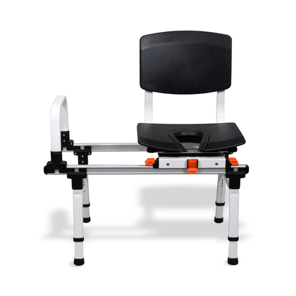 The ShowerGlyde SG3 Sliding Transfer Bench with Swivel Seat features a black and white adjustable-height frame, armrests, backrest, central seat opening, and an orange safety lock—ideal as a compact bathroom bench.