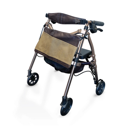 The Signature Life Elite Travel Rollator is a lightweight, foldable walker with four wheels, hand brakes, a seat, and a brown front storage pouch, shown against a white background.