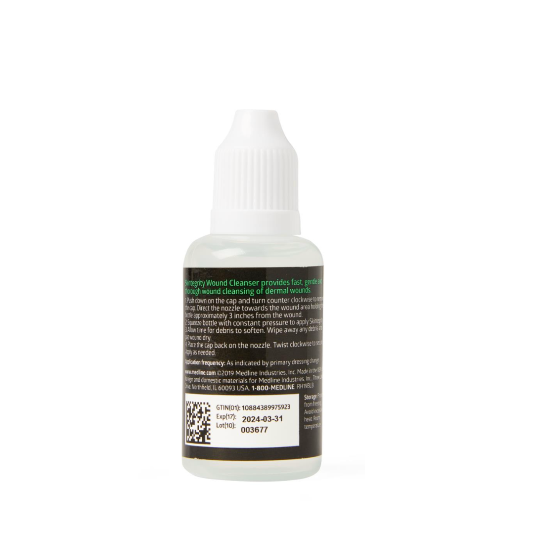 A small clear plastic bottle with a white nozzle cap contains Medline Skintegrity Wound Cleansers for wound care. The label shows product details, use directions, barcode, QR code, and an expiration date of 2024-03-31.