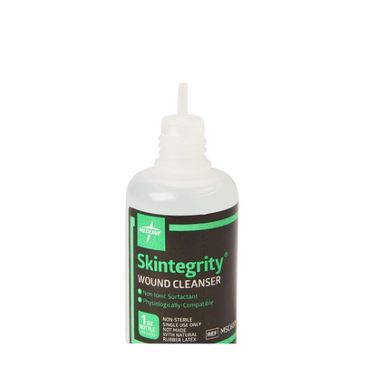 A 1-ounce bottle of Medline Skintegrity Wound Cleanser with a pointed nozzle cap. The black and green label notes it's non-sterile, non-ionic, and physiologically compatible—ideal for wound care.