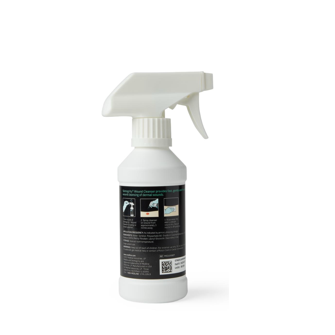 A white spray bottle with a trigger nozzle and a black label featuring instructions, images, a QR code, and wound care details for Medline Skintegrity Wound Cleansers. The background is plain white.