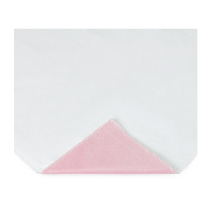 A Medline Sofnit 300 Reusable Underpad, folded to reveal its soft pink underside, combines comfort and style. Sold in a case of 24, this underpad features a practical design with a plain white top for everyday use.