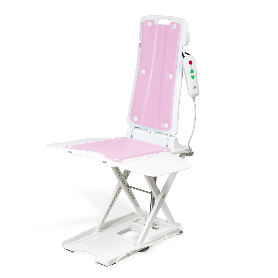 The SolutionBased BathLyft is a white and pink battery-powered bathtub lift chair featuring a reclining backrest, seat, and remote control to help individuals with mobility needs safely enter and exit the tub.