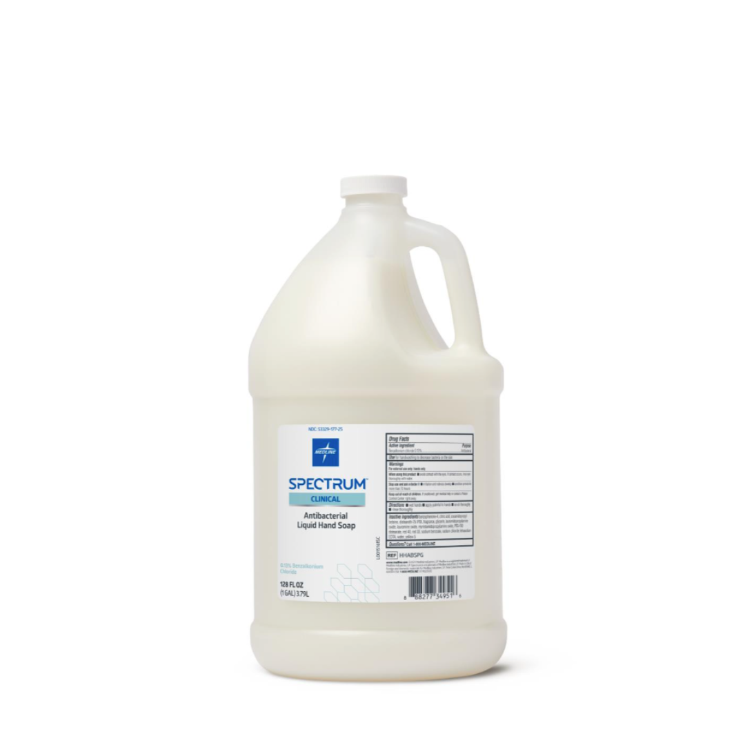 A gallon-sized plastic jug of Medline Spectrum Advanced Lotion Hand Soap with Aloe Vera includes a handle and spout, and features a white and blue label with product details and usage instructions.
