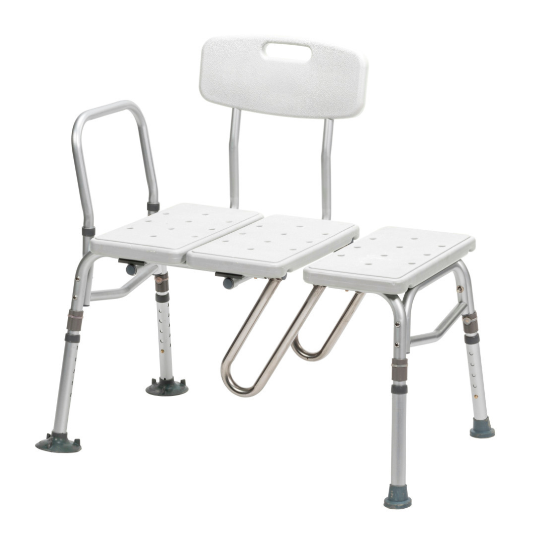 The Drive Splash Defense™ Transfer Bench with Curtain Guard Protection is a white and silver adjustable shower bench for seniors, featuring a backrest, armrest, and drainage holes to enhance bath safety during transfers.