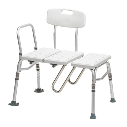 The Drive Splash Defense™ Transfer Bench with Curtain Guard Protection is a white and silver adjustable shower bench for seniors, featuring a backrest, armrest, and drainage holes to enhance bath safety during transfers.