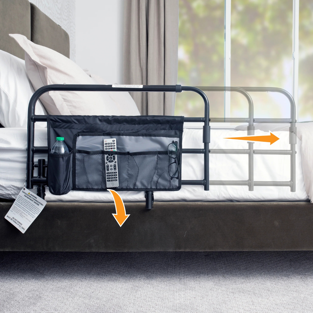 The Stander Wonder Extendable Pivot Bed Rail attaches to your bed for nighttime safety and includes storage pockets for essentials. Its adjustable design slides out for extra length, as shown by the arrow.