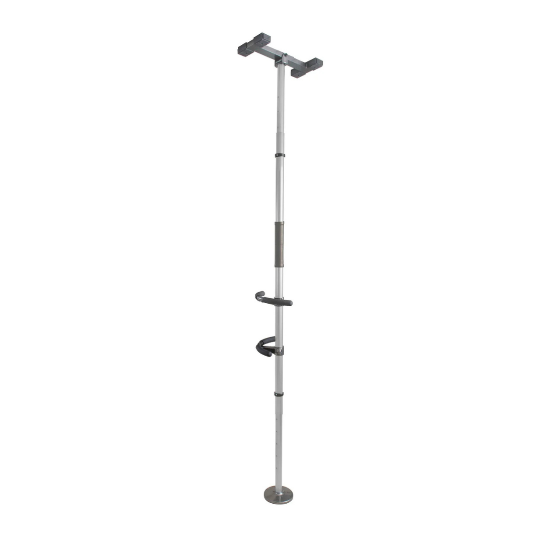 The Stander Wonder Pole Premium is a tension-mounted metal fall prevention pole with rubber grips, circular base, and T-shaped top, designed to assist users with standing, sitting, or moving safely in the bathroom. Universal fit for stability support.