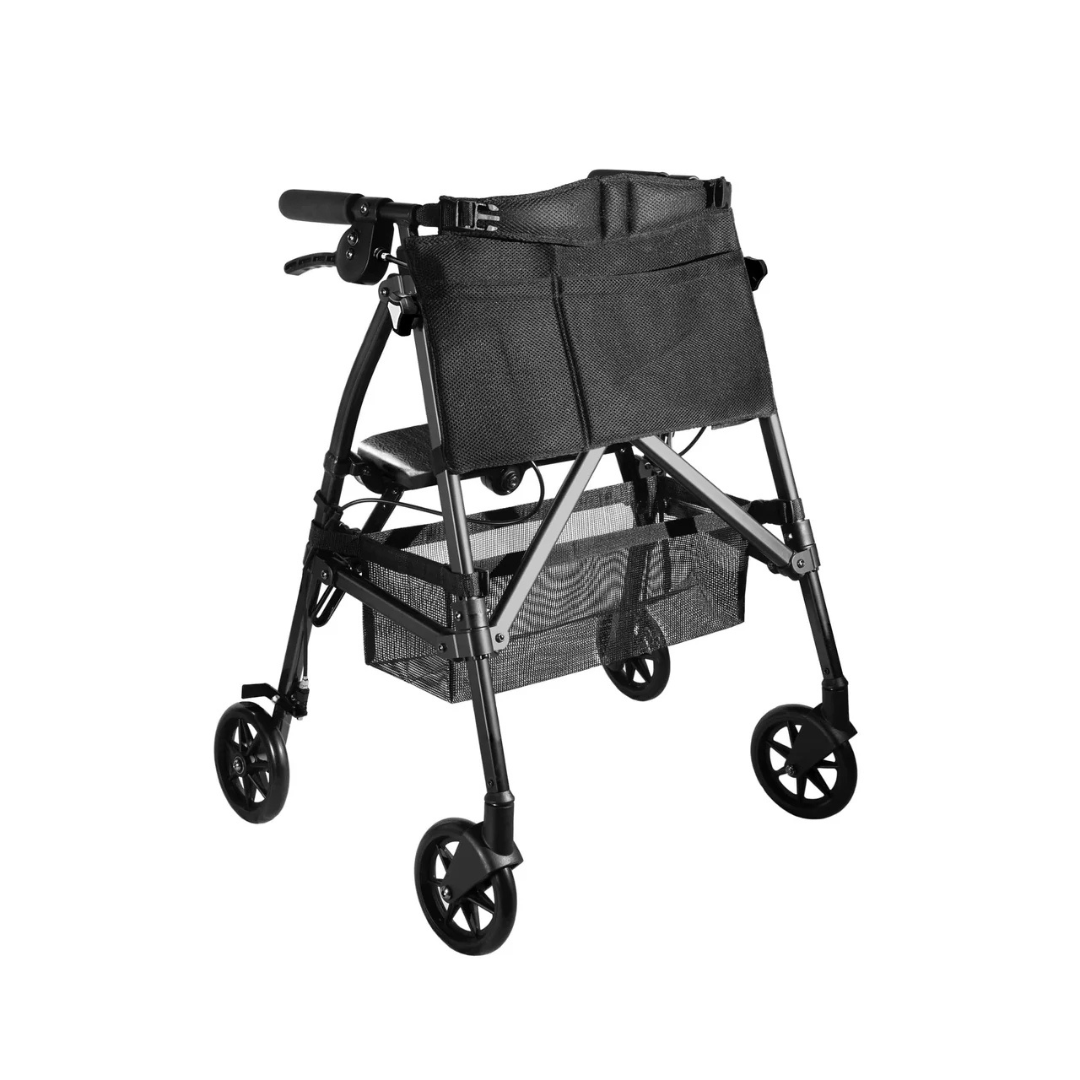 The Stander Wonder Rollator Plus is a black, compact folding rollator with four wheels, hand brakes, a built-in seat, an under-seat storage basket, and a rear pouch, shown against a white background.